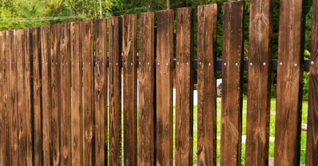enhancing property aesthetics with lumber fence installations